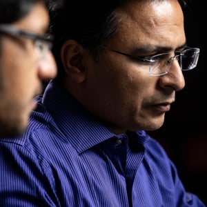 Photo of PNNL researchers Rounak Meyur and Sumit Purohit